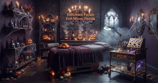 Halloween facials in Fort Myers, Florida at Lumina Skin Sanctuary: a candlelit treatment room with jack-o-lanterns, cobwebs and a facial bed