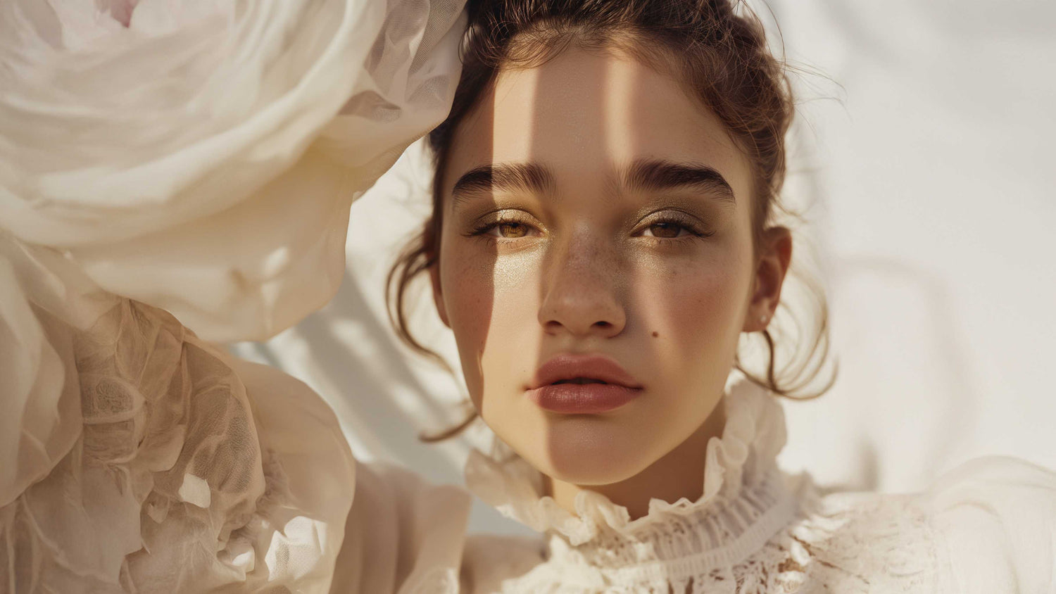 Glowing skin with natural makeup, soft lighting, and elegant white ruffles for clean skincare beauty